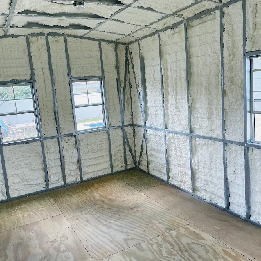 Closed-cell spray foam insulation applied to wall cavities in a residential project in Bermuda Dunes